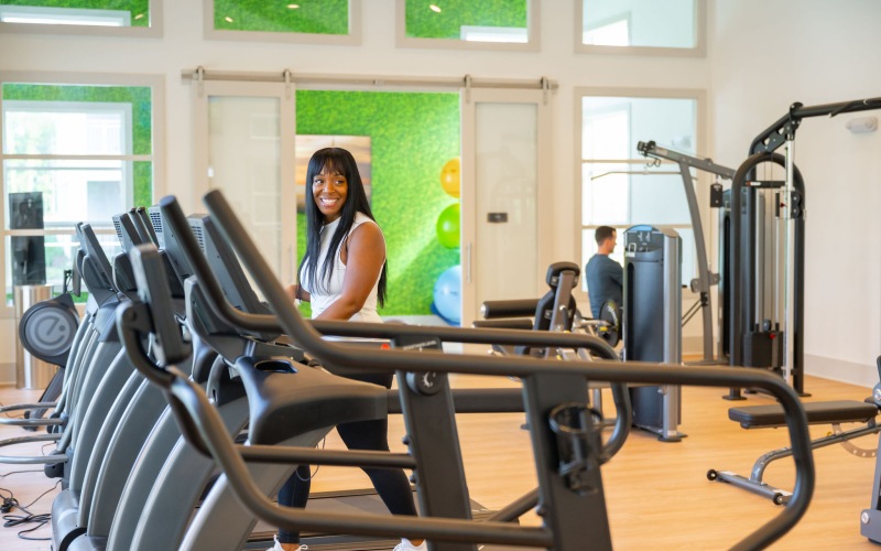 woman on treadmill in gym