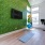 Room with mat, tv, and stationary bike