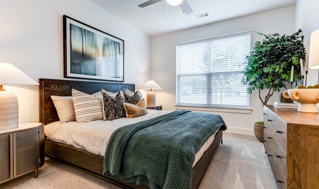 Bedroom image of bedroom with large window and side tables
