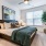 Room with bed, end tables, dresser, and window