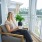 Woman sitting on her balcony at Marion Lake brand new apartments in Savannah, GA